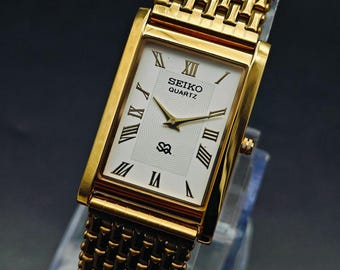 Vintage Slim tank Quartz White Roman Dial and Gold Case, Unisex