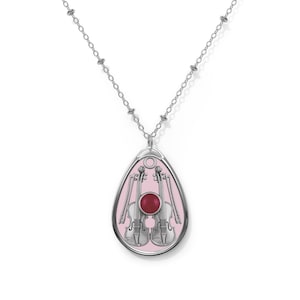 Classical Symphony Strings Oval Necklace | Silver Violin F-Holes, Bows & Ruby