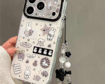 Coque transparente pour iPhone, autocollants lapin, coque de protection lapin mignon avec dragonne perlée noire, coque iPhone 17 Pro, coque iPhone 17 Pro Max