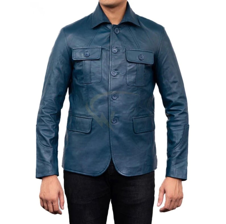 May include: A blue leather jacket with a button-up front, two chest pockets, and two lower pockets. The jacket has a collared neckline and long sleeves. The leather appears to have a slight sheen.