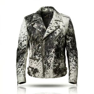 May include: A motorcycle jacket featuring a black and white cowhide print pattern. The jacket includes a notched lapel, an asymmetrical front zipper closure, multiple zippered pockets, shoulder epaulets, and adjustable side buckles at the waist.