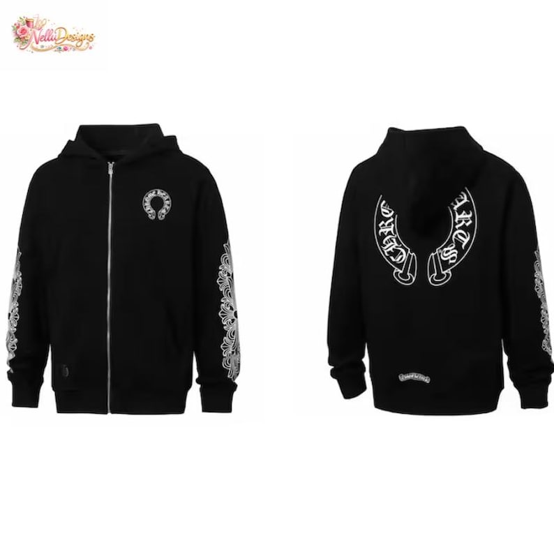 May include: Black zip-up hoodie with white decorative patterns on the sleeves and a horseshoe design on the front. The back features a horseshoe design with the text "Chrome Hearts".
