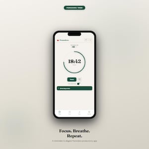 Peut inclure: Un smartphone affichant l'interface d'une application de minuterie Pomodoro avec un cercle vert foncé réglé sur 18:42, un bouton pause et un champ de tâche Write blog article. L'écran inclut le texte Pomodoro, Focus, Breathe, Repeat et Pomodoro Timer.