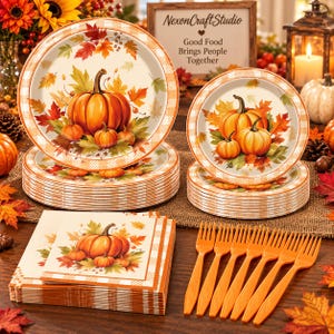 May include: A set of disposable party supplies featuring a pumpkin and autumn leaf pattern. The collection includes large and small round plates, square paper napkins, and orange plastic forks, all decorated with a white and orange plaid border.