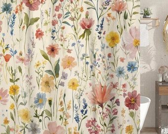 May include: A floral shower curtain with a watercolour design of various flowers in shades of pink, yellow, blue, and orange against a cream background. The curtain hangs from a curved shower rail.