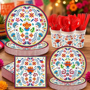 May include: A set of disposable party supplies featuring a white background with colorful floral and foliate patterns in red, blue, yellow, and green. The set includes round paper plates, square paper napkins, paper cups, and red plastic cutlery.