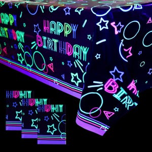 May include: A black rectangular tablecloth featuring a neon-style print with the text HAPPY BIRTHDAY in bright pink, blue, and green. The design includes glowing stars, circles, and triangles, with horizontal stripes along the bottom edge.