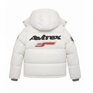 May include: White puffer jacket with a hood, featuring the "Avirex" logo in black and red on the back. The jacket has a quilted design, black and red striped cuffs, and patches on the sleeves. A winter outerwear item.