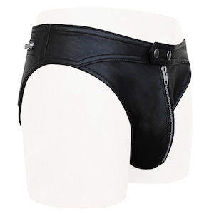 May include: Black leather underwear featuring a prominent vertical silver-toned metal zipper running down the center front, a wide waistband with two silver-toned snap button closures, and an additional small horizontal zipper on the side hip.