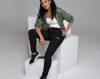 Pantalones deportivos unisex minimalistas bordados, unisex premium, pantalones deportivos de estilo urbano, pantalones cómodos para el día a día, el diseño evoca fuerza.