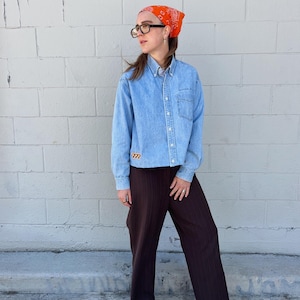 seventh sense 777 spell out button up