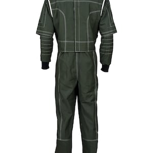 May include: A dark olive green racing suit featuring white contrast stitching throughout. The garment includes a high collar, short sleeves with black ribbed cuffs, and white shoulder panels. The design showcases a structured, multi-panel construction with visible seams and a full-length back closure, presenting a uniform appearance from the rear view.
