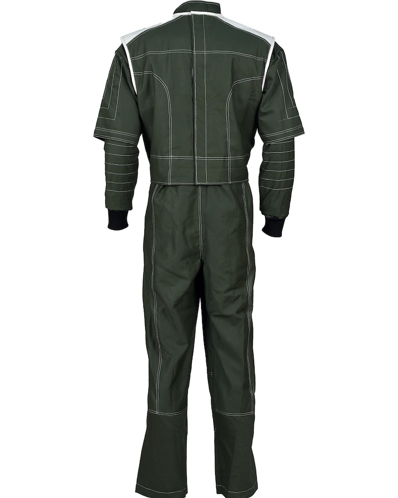 May include: A dark olive green racing suit featuring white contrast stitching throughout. The garment includes a high collar, short sleeves with black ribbed cuffs, and white shoulder panels. The design showcases a structured, multi-panel construction with visible seams and a full-length back closure, presenting a uniform appearance from the rear view.