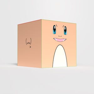 Puede incluir: Un objeto en forma de cubo con un diseño de Charmander. El cubo es de color melocotón con una barriga blanca y una cara de Charmander en un lado, con ojos azules y una boca sonriente. Hay un pequeño dibujo en el lateral.