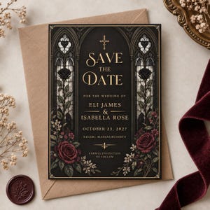 May include: A rectangular Save the Date card featuring a black background with gold text, gothic arch motifs, and dark red roses. The text reads: Save the Date for the wedding of Eli James and Isabella Rose, October 23, 2027, Salem, Massachusetts.