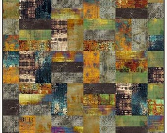 May include: A rectangular quilt featuring a patchwork design of various rectangular fabric blocks. The pattern includes a mix of textures, grid lines, distressed surfaces, and muted colors like ochre, olive green, charcoal, and rust.