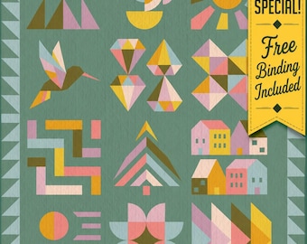 May include: A green quilt featuring a grid of geometric patterns including triangles, a hummingbird, diamonds, a sun, a tree, and houses. A yellow banner on the right side displays the text SHOP SPECIAL! Free Binding Included.