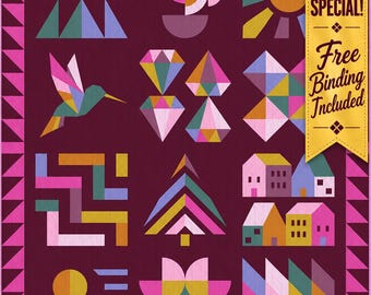 May include: A dark purple quilt featuring a grid of geometric patterns including a hummingbird, diamonds, houses, a tree, and abstract shapes. A yellow banner on the right side displays the text SHOP SPECIAL! Free Binding Included.