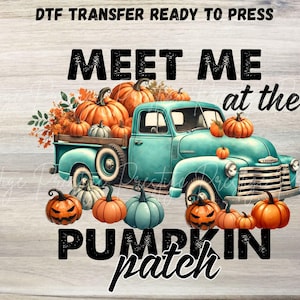 May include: DTF transfer design featuring a teal vintage truck filled with pumpkins. The text "MEET ME at the PUMPKIN patch" is displayed in black. Orange and teal pumpkins surround the truck, creating a fall theme.