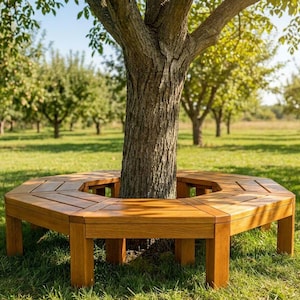 May include: A hexagonal wooden tree bench constructed from light brown planks, featuring a central opening designed to surround the trunk of a tree. The bench has a flat, slatted seat surface and sturdy vertical legs positioned on the grass.