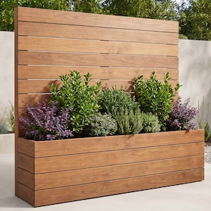 May include: A rectangular wooden planter box featuring a tall, slatted privacy screen back panel. The natural brown wood grain is visible throughout the structure. The planter is filled with a variety of green and purple leafy shrubs and plants.