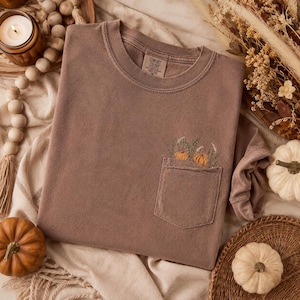 Sudadera con bolsillo bordada con calabazas de la cosecha de otoño