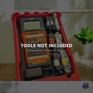 May include: A red plastic carrying case containing a Brother label maker with an orange and black interface, a QWERTY keyboard, and a digital screen. The case includes molded compartments for accessories. Text reads: PAWL, TOOLS NOT INCLUDED.