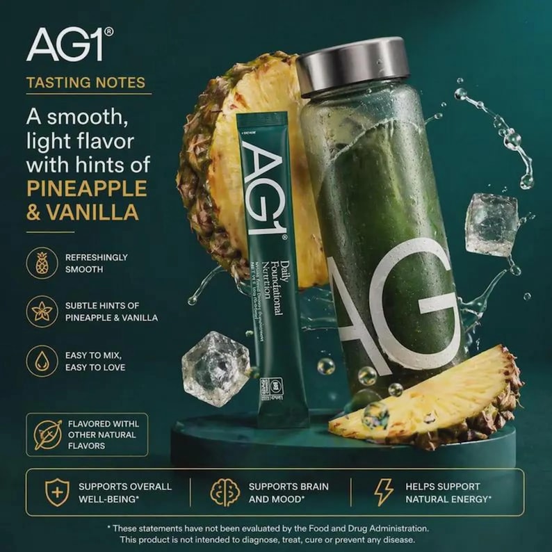 May include: An advert for AG1 Daily Foundational Nutrition. The image shows a green packet and a clear bottle with the AG1 logo, pineapple slices, and water droplets. Text highlights the pineapple and vanilla flavour.
