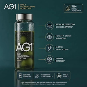 May include: A glass bottle containing green liquid, labelled "AG1 Daily Foundational Nutrition." The image features text detailing benefits such as regular digestion, healthy brain, energy production, and immune defence. It also states "75+ Premium Ingredients."