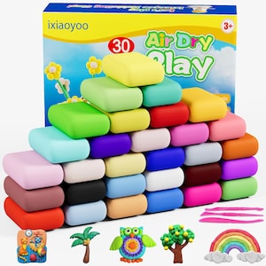 May include: A colorful set of air dry clay with 30 pieces in various colors, including yellow, green, red, and pink. The box reads "Air Dry Play" and includes modeling tools and pre-made clay figures of an owl, tree, and rainbow.