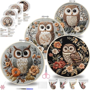 May include: A collection of owl embroidery kits. Each kit features a detailed owl design with colorful floral accents, set within a wooden embroidery hoop. Includes needles, thread, scissors, and instructions. The hoops are approximately 8 inches in diameter.