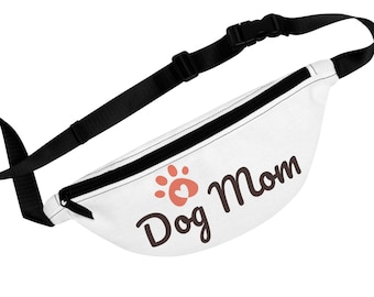 Riñonera para mamás perrunas: bolso de cintura de lona blanca con logo de huella de pata.