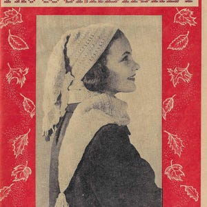 May include: Vintage magazine cover featuring a woman in profile wearing a knitted head covering and scarf. The cover has a red border with white leaf illustrations and the text "The WORKBASKET" in cross-stitch style.