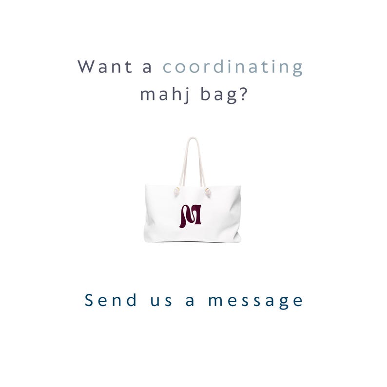 May include: A white tote bag with two white rope handles and a dark maroon letter M logo on the front. The text above the bag reads "Want a coordinating mahj bag?" and the text below the bag reads "Send us a message" in dark blue lettering.