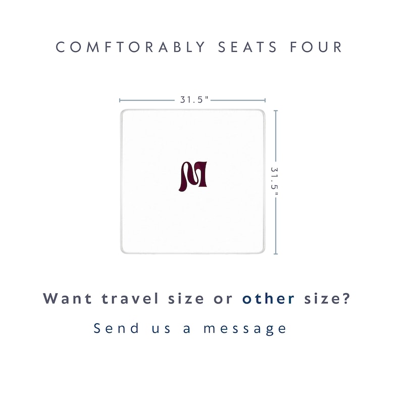 May include: A square white table with a dark maroon letter M in the centre. The table measures 80 cm by 80 cm. Text above reads COMFTORABLY SEATS FOUR. Text below reads Want travel size or other size? Send us a message.