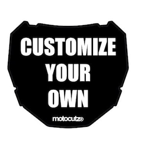 May include: Black, shield-shaped product with the words "CUSTOMIZE YOUR OWN" in bold white letters. The brand name "motocutz®" is at the bottom. The product is likely for customization.