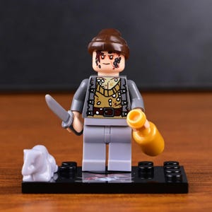 May include: A Lego minifigure of a character with a brown hat, gray jacket, and gray pants. The figure has a scarred face and holds a silver knife and a yellow bottle. A white object and black base are in the foreground.
