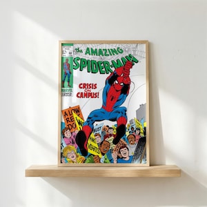 May include: Framed comic book cover of The Amazing Spider-Man, issue #68, featuring Spider-Man in action. The cover art shows Spider-Man in a red and blue suit, with the text "CRISIS ON CAMPUS!" and "MARVEL COMICS GROUP".