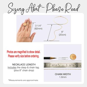 May include: Image with text "Sizing Alert - Please Read" showing necklace measurements. The necklace chain drop is 8 inches (20cm). The chain width is 1.8mm. The image also shows a hand with a ring and a ruler.