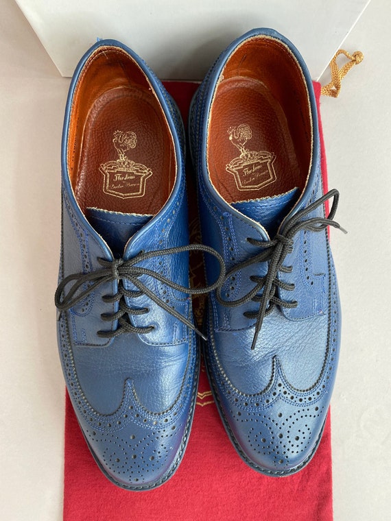 blue leather wing tip florsheim