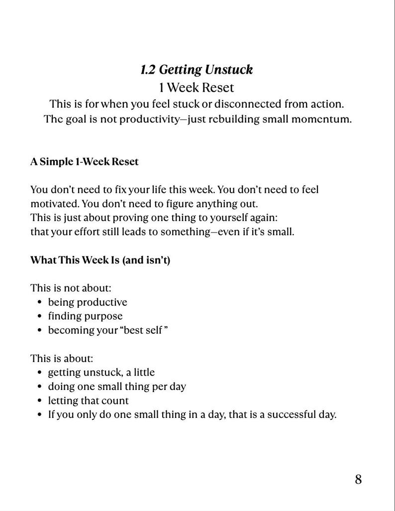 May include: A white page with black text titled "1.2 Getting Unstuck, 1 Week Reset." The text explains the goal is to rebuild momentum. Additional text includes "A Simple 1-Week Reset" and bullet points about what the week is and isn't about.