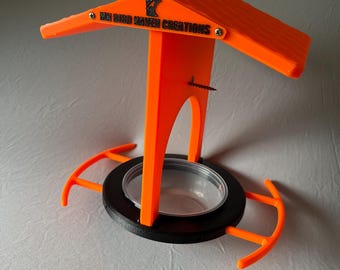 Mangiatoia per uccelli Oriole da appendere, con coppetta per gelatina rimovibile e spiedini d'arancia.