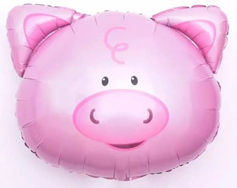 Könnte beinhalten: Rosafarbener Folienballon in Form eines Schweinekopfes mit einem lockigen Schweif und schwarzen Augen. Das Schwein hat eine rosa Schnauze und ein kleines Lächeln.