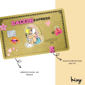 May include: A gold-coloured credit card design with the text "BADIE EXPRESS" in pink. The card features a cartoon character, decorative stickers, and the text "MEMBER SINCE 09". The card also has the text "SCRATCH PROTECTION BUILT IN" and "REMOVES CLEAN - NO RESIDUE".