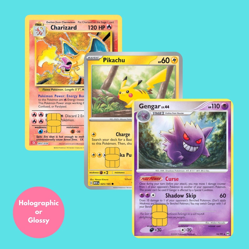 May include: Three trading cards featuring Charizard, Pikachu, and Gengar with gold chip overlays. The Charizard card is orange, the Pikachu card is yellow, and the Gengar card is purple. A pink circle in the corner contains the text Holographic or Glossy.