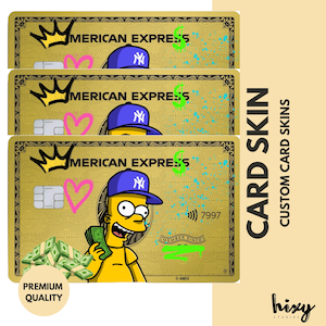 May include: Three gold-colored card skins with a cartoon character wearing a blue baseball cap. The cards feature the text "AMERICAN EXPRESS" and a pink heart. The words "CARD SKIN" and "CUSTOM CARD SKINS" are also visible.