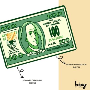 May include: A cartoon illustration of a one hundred dollar bill with a portrait of Benjamin Franklin. The bill has a gold-colored chip and the text "The United States of America". The image also includes the text "Scratch Protection Built In" and "Removes Clean - No Residue".