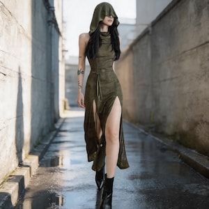 olive green dress black boots Olive greenin faux leather. I actually purchased this gorgeous dress right  around when we were pretty much in lock down. It didn't see much action  other than the inside of my closet