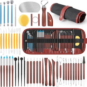 May include: A comprehensive pottery and sculpting tool set. The set includes various tools such as ball stylus tools, loop tools, ribbon tools, and modeling tools. The tools are made of wood, metal, and plastic, and are organized in a brown leather-like roll-up case.