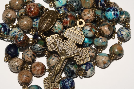 10mm Ocean Imperial Jasper in Bronze with a Pardon Crucifix handmade in Oklahoma